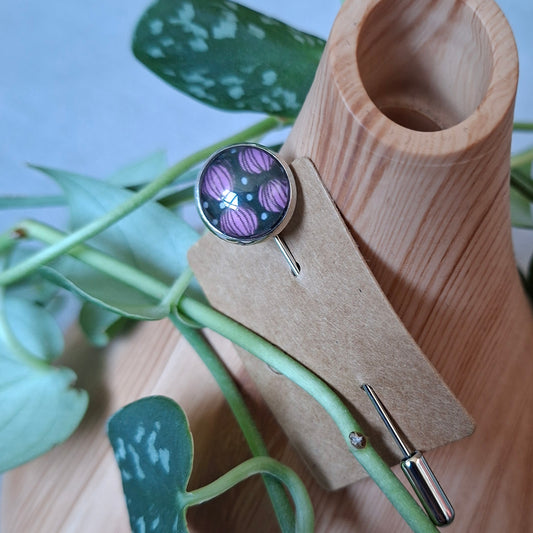 Pink and black stick pin brooch