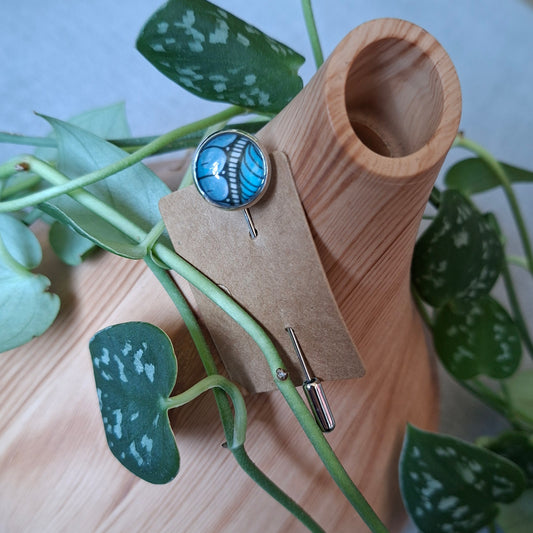 Blue and white stick pin brooch